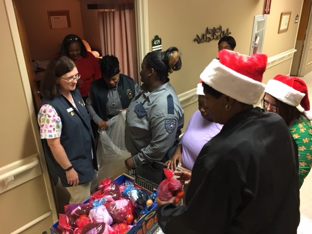 Ellis Unit employees delivering gifts